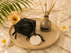 High - end designer - style air freshener for car or home, featuring an elegant black and white look and perfect for stylish gifting year - round. - Aura & Aroma